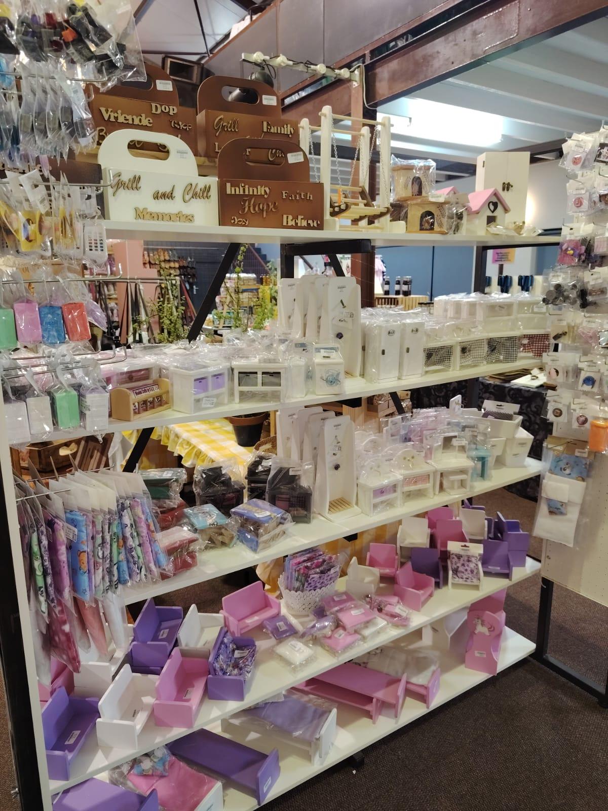 Wooden Crafts By S & K market display with handcrafted wooden gifts, personalised trays, and dollhouse furniture in Cape Town